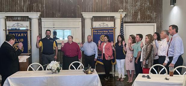 A swearing in and induction of new Rotary Club officers and board members was held Wednesday at noon. Judge Ellis Daigle performed the swearing in duties. Jacob Bergeron is the new Rotary Club president. Outgoing president is Coby Clavier. From left are Judge Ellis Daigle, Jacob Bergeron, president; Pat Dossman, vice president; Shirley Vige, treasurer; Nickie Toups, secretary; Michelle DeRouen, Kitty Jo Deshotel, Donnie Richard, Carey Lawson, Erika Fontenot, Jacque Pucheu and Dwight Jodon, board members. (S