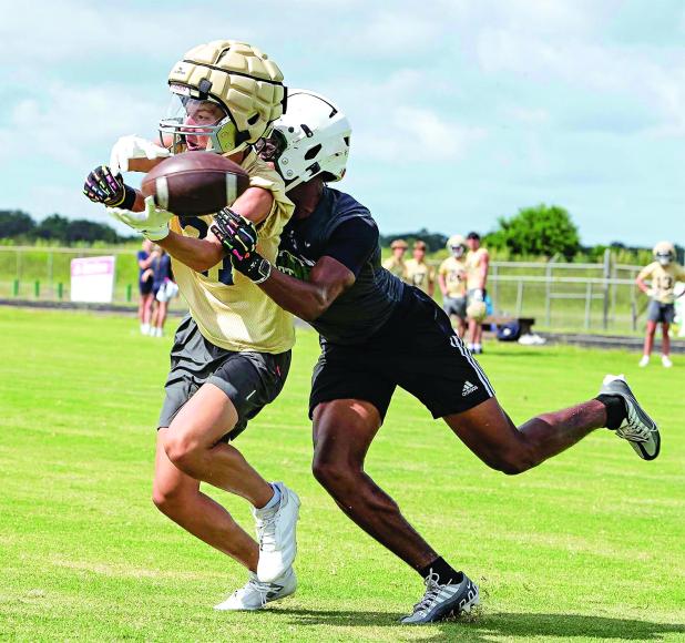 A Eunice High defender makes a move to defend a pass during Eunice High’s 7-on-7 scrimmage with Sacred Heart on Wednesday. The 7-on-7 format typically involves 20-minute games where teams only are allowed to pass but aren’t allowed to pass rush. It’s meant to give wide receivers, quarterbacks and defensive backs more extensive reps. (Photos by Dwight Jodon)