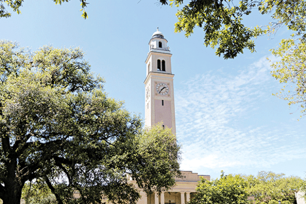 LSU’s Memorial Tower displays the time on Monday, March 20, 2023, on Tower Drive in Baton Rouge. (Matthew Perschall for Louisiana Illuminator)