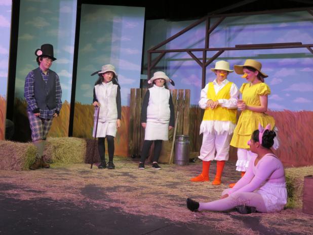 The barnyard animals greet Wilbur as he arrives at the farm in “Charlotte’s Web.  From left, Miles Richard as Templeton, the rat; Shelby Niles as Sheep; Sadie Maricle as Lamb; Isaack Henderson as Gander; Elle Soileau as Goose; and Lillian Veillon as Wilbur. (Submitted photo) 