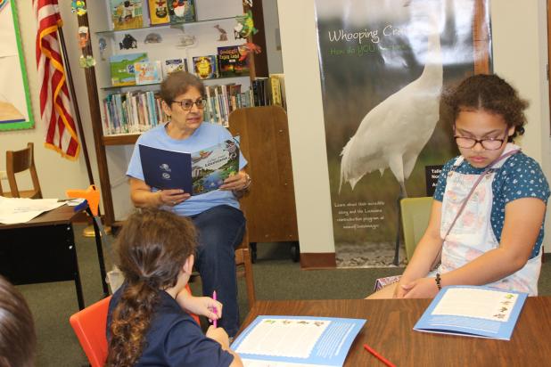 Donna Baltakis, director of Keep Eunice Beautiful, was invited Wednesday at the library to speak to children about saving our environment, and keeping Eunice beautiful and litter-free. (Photos by Myra Miller)