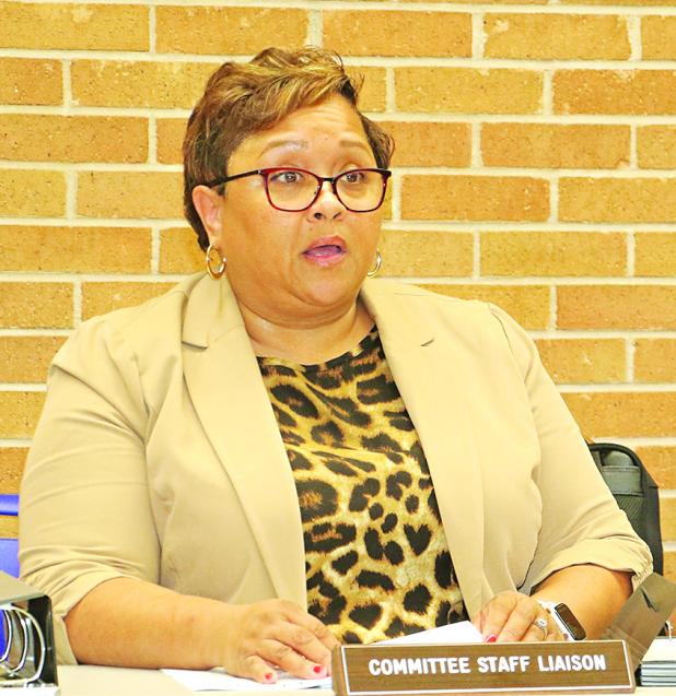 Dwanetta Scott, executive director of Child Welfare & Attendance, reviews policies at a St. Landry Parish School Board committee of the whole meeting on Monday. 