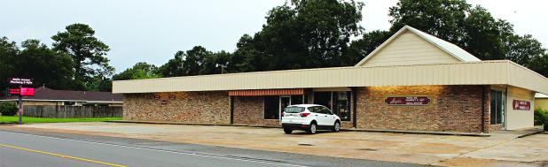 Augie’s Maple Avenue Pharmacy & Gifts before opening on Wednesday morning. The West Maple Avenue business is celebrating its 50th year in operation. (Photo by Myra Miller)
