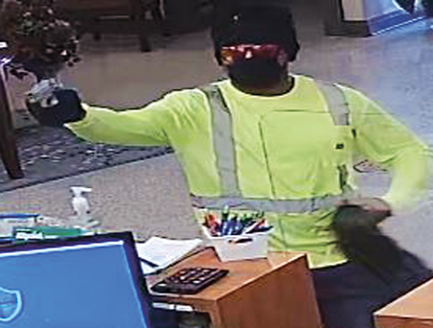 Surveillance photos of Rayne robbery suspect and vehicle.