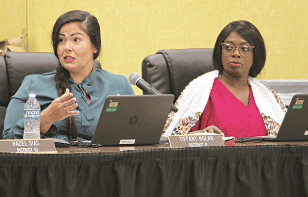 St. Landry Parish School Board members, from left, Tiffany Nolan and Timmakah Hardy at Thursday’s Board meeting in Opelousas. Nolan was commenting on a proposed school study by demographer Mike Hefner. (Photo by Harlan Kirgan)