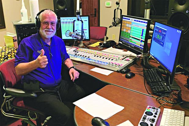 Kenneth Granger on the air in the studio at radio station KRVS. (KRVS photo)