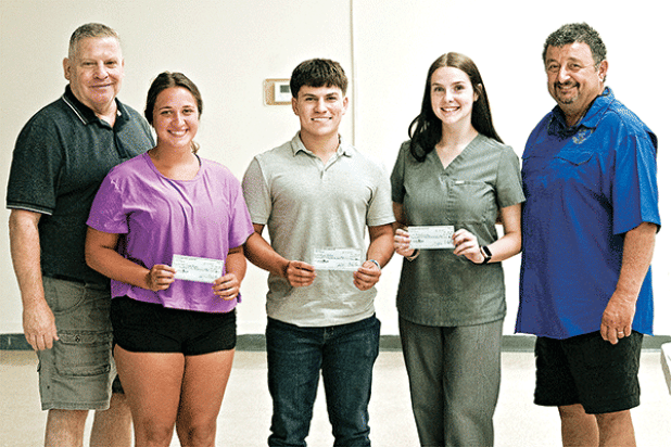 The CFMA, Acadiana Charter Chapter in Eunice, awarded four school scholarships at this month’s meeting to a few outstanding students at $250 each. If they remain in school they receive another $250 in January, 2025. From left are CFMA Vice President Leward Lafleur, Carlie Booth, Ryan Trahan, Mollie Sonnier, and CFMA President Greg Brown. William LeJeune of Iota, who had just returned from a French Immersion class in Nova Scotia is not pictured. (Photo by Rick Nesbitt/KEUN Radio)