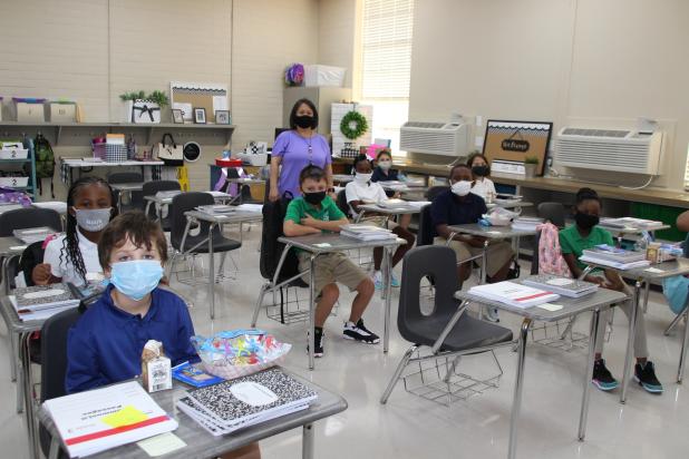 Eunice Elementary third graders inside new classroom