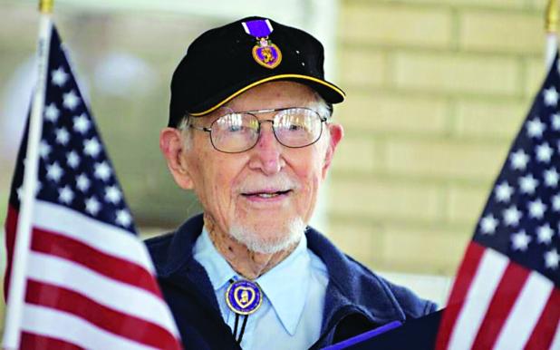 James Bollich, a survivor of the Bataan Death March, was honored with a car parade as he celebrated his 104th birthday on Friday. (Acadiana Advocate photos By Brad Bowie)