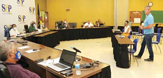 Lyn Henley, standing at right, a representative from Volkert Inc., speaks to St. Landry Parish School Board members on Monday during a meeting to decide on a master plan for a building program. (Photo by Harlan Kirgan)