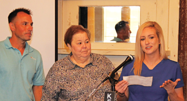 A check for $4,650 from the Eunice Rotary Club was presented to the Eunice Community Health Center at the club’s meeting on Wednesday. The money is from the Eunice Rotary Zydeco Triathlon held in April. Accepting the check on behalf of the clinic was Alisa Ardoin, right. Also shown, from left, are Rotarians Coby Clavier and Pat Dossman. (Photo by Harlan Kirgan)