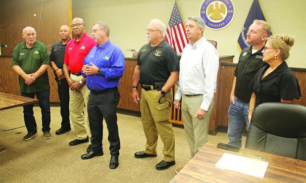 At Wednesday’s meeting in the Eunice City Council Chamber, from let, are: Ernest Blanchard, Parish Council member; Jody White, Parish Council chairman; Jimmie Edwards, Parish Council member; Jessie Bellard, parish president; Kyle LeBouef, Eunice Police chief; Scot Fontenot Eunice mayor; Randall Reed, Eunice alderman; and Connie Thibodeaux, Eunice alderwoman. (Photo by Harlan Kirgan)