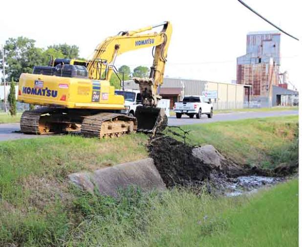 Crews were out Wednesday cleaning the concrete portion of the drainage canal that begins south of Laurel Avenue at Nimitz Street,