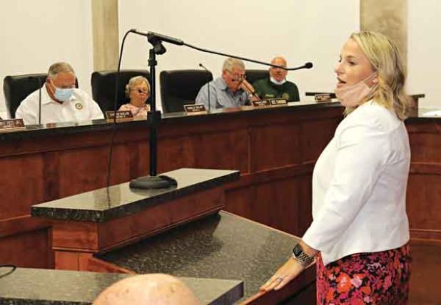 Alisha Mire, of Eunice, talks to the St. Landry Parish Council on Wednesday. (Photo by Harlan Kirgan)