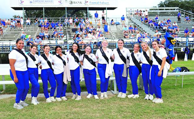 St. Edmund High School football trainers before the game against Elton on Friday, from left, are Reagan Gradney, Rose Young, Brooklyn Fontenot, Seyda Deshotel, Caroline Fontenot, Amelie Fontenot, Brylee Brown, Addison Lasage, Emily Manuel, Jesslyn West and Isabella Arnaud. (Photo by Amy Myers)