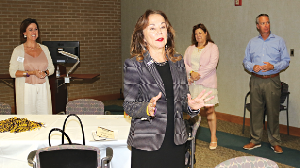 LSU Eunice Chancellor Dr. Nancee Sorenson welcomes those attending the Destination Brunch of the Acadia Parish Tourism Commission. From left, are Nancy Loewer, Acadia Convention and Visitors Commission; Sorenson; Carey Lawson, executive director of the LSUE Foundation and University Advancement; and Jeff Willis, LSUE athletic director. (Photo by Harlan Kirgan)