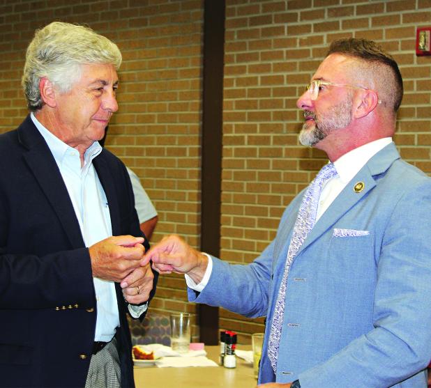 Jonathon “JP” Perry, a Louisiana 3rd Circuit Court of Appeal Judge, speaks with Jacque Pucheu after the meeting. (Photo by Myra Miller)