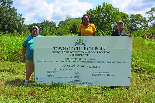 Plans are in motion to construct two detention ponds in Church Point, one in the Low Bottom area, and another near Corporation Street. The ponds, funded by a $2.9 grant from the Louisiana Watershed Initiative, will help to alleviate flooding in the  community. (Above) Pictured are Church Point Mayor Ryan "Spanky" Meche, Ward 1 Council member Christine Semien and Ward 5 Council member Errol "Slu" Comeaux in the Low Bottom area.