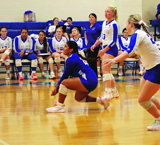 St Edmund’s Seyda Deshotel with a dig  in the match with Opelousas. (Photo by Amy Myers)