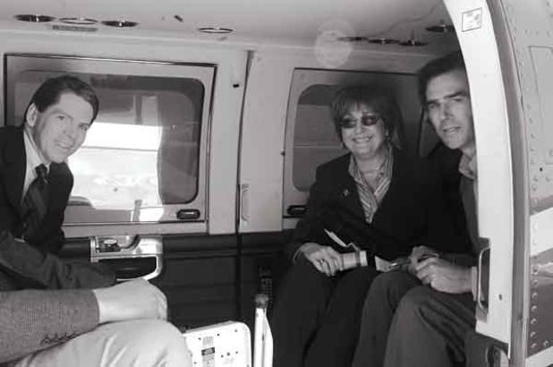 Author Robert Mann, left, on a State Police helicopter with the late Gov. Kathleen Blanco and journalist Tyler Bridges in 2004. (Photo Courtesy of Robert Mann)