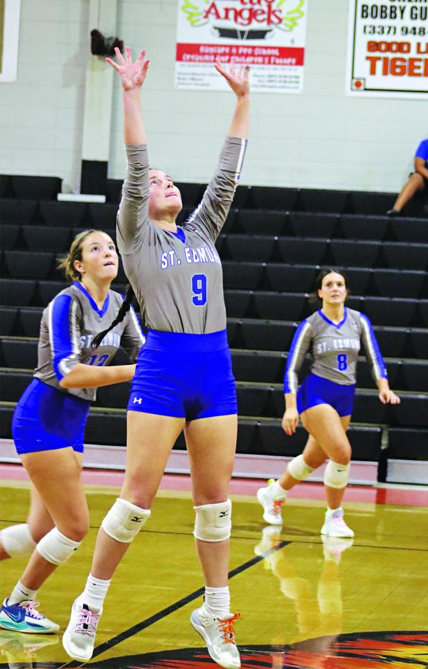 St. Edmund defeated Opelousas High in volleyball. From left, are, from left, Laura Kate Miller, Emma Myers and Millie Miller. (Photo by Amy Myers)