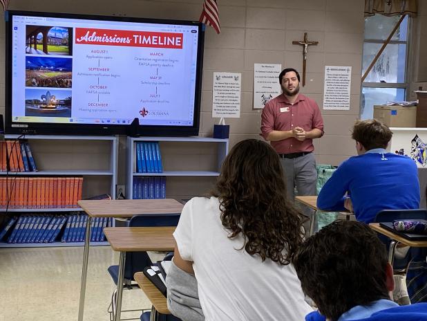 Sam Farmer, admissions counselor at University of Louisiana at Lafayette gave a presentation to St. Edmund seniors about all aspects of campus life at UL. 