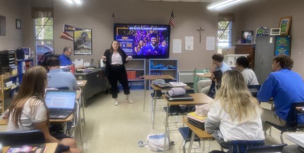 Alyssa Castro, admissions counselor with Louisiana State University, presented to seniors at St. Edmund High about different aspects on campus