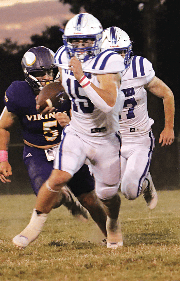 Blue Jay quarterback Kane West ran for 103 yards in the 46-42 win over Opelousas Catholic. (Photo by Amy Myers)