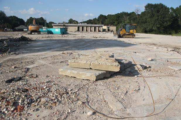 Concrete and two buildings are that remain of the former Moosa Memorial Hospital in Eunice. (Photo by Harlan Kirgan)