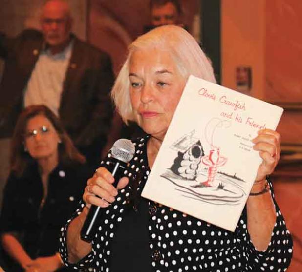 Julie Landry, daugher of Clovis Crawfish founder Mary Alice Fontenot, is shown in October 2018 at a reading she delivered at the Liberty Theatre. Landry will be in Eunice on April 9 to help celebrate Clovis Crawfish’s 61st birthday (Photo by Harlan Kirgan)