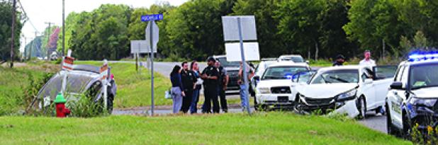 At about 12:30 p.m. Thursday a two-vehicle wreck occurred at the intersection of La. 13 South and Sittig Road.  A report from Eunice Police Chief Kyle LeBouef, said, “One vehicle traveling east attempting to cross over Hwy. 13 from Sittig Road onto Perchville Road struck a northbound vehicle on Hwy. 13. No injuries were reported.” (Photo by Harlan Kirgan)