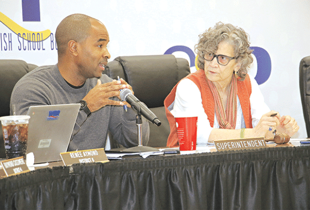 St. Landry Parish School Superintendent Milton Batiste III, left, and School Board President Mary Ellen Donatto at Saturday’s Board retreat to discuss consolidation. (Photo by Harlan Kirgan)