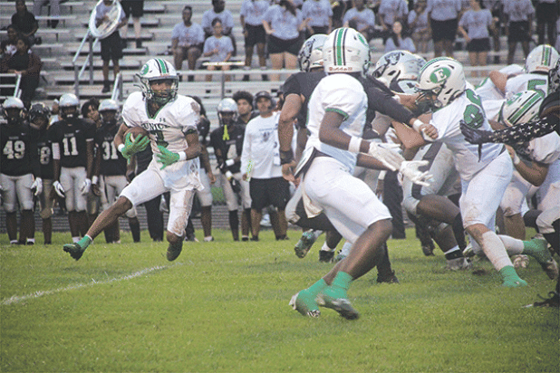 Eunice High’s Malik Thomas hunts for a hole in the Northwest defense. (Photo by Rhett Manuel)