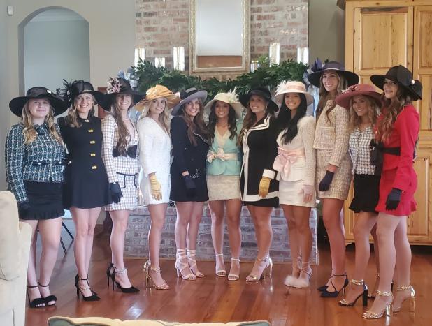 St. Edmund maids enjoy a traditional homecoming tea.