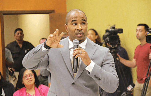 Milton Batiste makes his presentation before being selected as St. Landry Parish superintendent. (Photo by Harlan Kirgan)