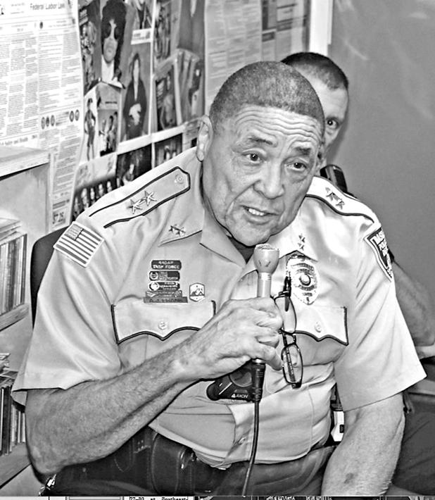 A. J. Frank, assistant police chief for the Town of Basile, speaks during a local law enforcement call-in show program on KVPI radio in Ville Platte. (KVPI Photo)