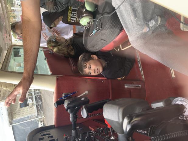 Lathen Brown enjoys a cockpit of an airplane