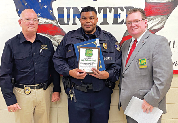 St. Landry Crime Stopper recognized Eunice Police Sgt. Quitin Doyle as the Supervisor of the Year. Doyle, center, is with Eunice Police Chief Randy Fontenot, left, and St. Landry Parish Sheriff’s Deputy Chief Eddie Thibodeaux. (Submitted photo)