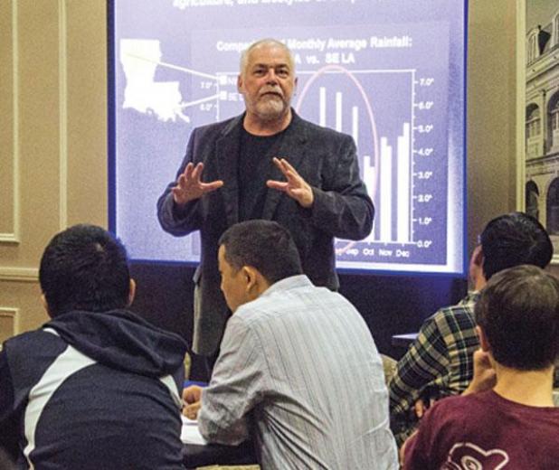 Jay Grymes, chief meteorologist, gives a presentation on Louisiana’s climate Wednesday during the intercultural dialogue on weather, water and climate. (Photo by Greta Jines)