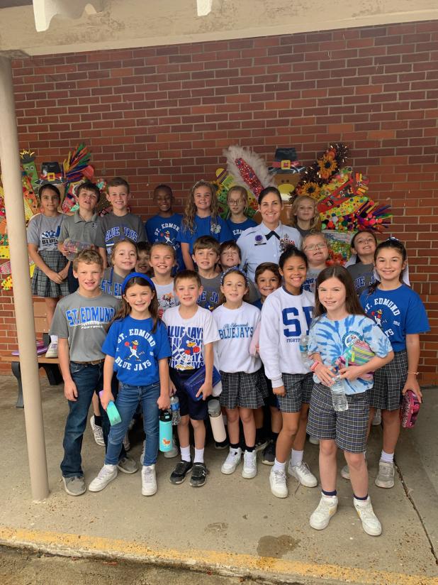 Master Sergeant Andre’ Menard stopped by at St. Edmund Elementary to thank third graders for sending letters to veterans they knew. 