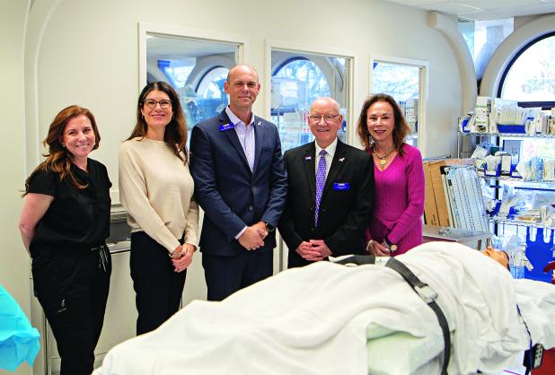 From left at the LSU Alexandria downtown campus on Friday are Heather Perilloux, LSUE surgical technology instructor; Renee Guillory, LSUE surgical technology program director; Jeff Langston, LSUA dean of the College of Health and Human Services; Dr. Paul Coreil, LSUA chancellor; and Dr. Nancee Sorenson, LSUE Chancellor. (Submitted photo)