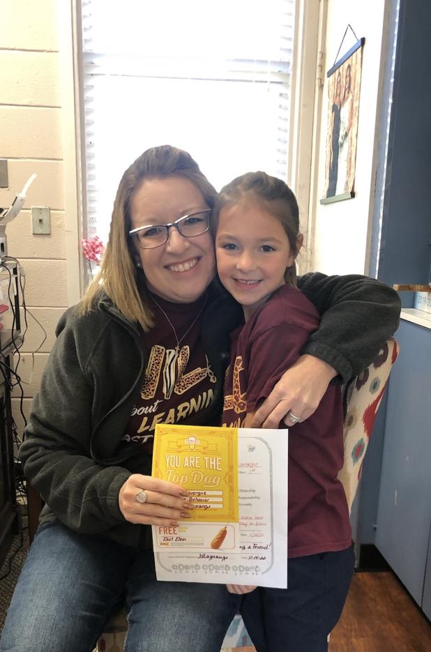 Brylee Lavergne is with her principal Gina LaGrange. 