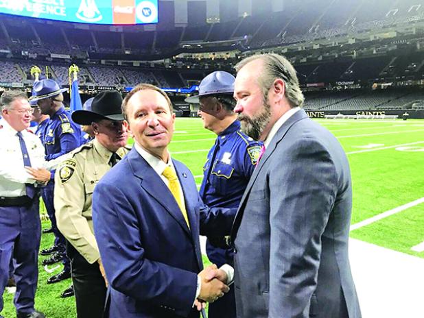 Gov.-elect Jeff Landry, left, shakes hands with Ed O’Callaghan, a former assistant U.S. attorney who will lead a review of Louisiana State Police practices and policy. Landry and Attorney General-elect Liz Murrill announced Wednesday, Nov. 29, 2023, at a Superdome news conference that O’Callaghan’s law firm will be hired to conduct the review. (Greg LaRose/Louisiana Illuminator)