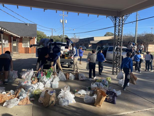 St. Edmund Catholic School partnered with the Eunice Rotary Club and participated in the Spirit of Christmas Food Drive sponsored by Super 1 Foods as a service for the holiday season.