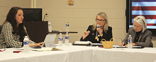 Newly elected president of the Evangeline Economic Development Authority, Opal Andrus, is in the center as she presides over the inaugural meeting on Monday, Dec. 16. At left, is newly elected secretary Raquel Manuel and, on the right is acting secretary Dr. Gwen Fontenot. (Ville Gazette photo by Tony Marks)