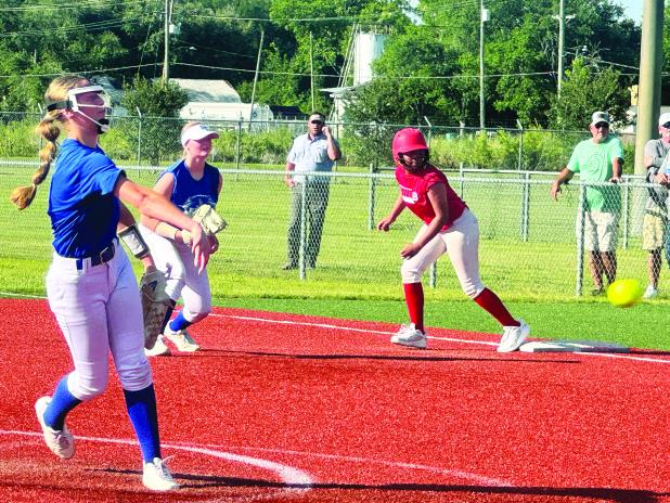  Seventh and eighth graders took the diamond for St. Edmund’s Lady Jays Wednesday, with just a few upper class-men sprinkled in, to take on Basile in summer softball league action.  Hosted at the Eunice Rec, the June contests are meant to help local coaches see what kind of lineups they have to work with for the upcoming season. Lady Jay Head Coach David Ardoin wanted to see if his less seasoned players could give a boost to his roster, so he sent in some new faces to gain valuable experience. 