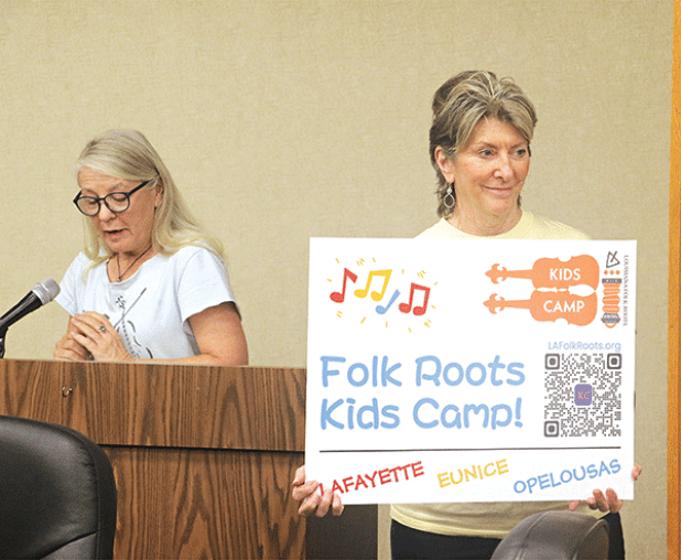 Jeanie Solis, left, executive director of Louisiana Folk Roots, aand Jean Johnson, a Folk Roots Board member, announced a summer Folk Roots Kids Camp in July at LSUE. (Photo by Harlan Kirgan)