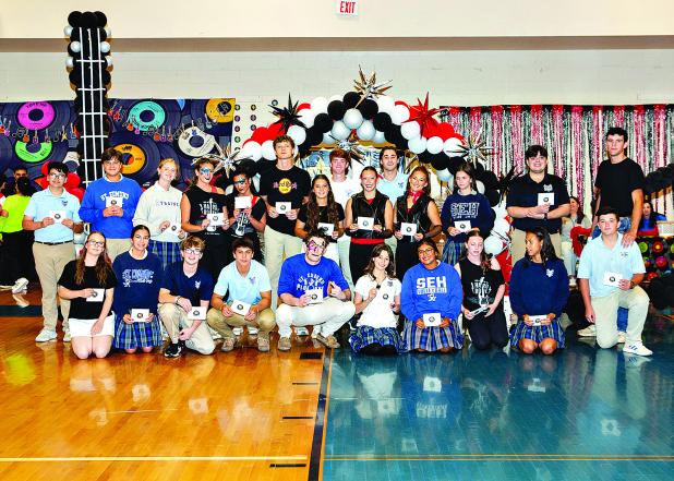 Literary Rally winners were recognized during the annual St. Edmund Academic Pep Rally. In front from left are Shawna Manuel, Sadie Spell, Tiltie Manuel, Michael Perron, Landen Marcantel, Rose Young, Seyda Deshotel, Georgia-Kate Wimberly, Ana Thomas and Beckette LaHaye. Standing in back from left are Cooper Ardoin, Cooper Devillier, Brylee Brown, Laura-Kate Miller, Caroline Heinen, Dane Fontenot, Maddie Evans, Oscar Summerlin, Lily Vidrine, Payton Credeur, Stella Summerlin, Minnie Stanford, Zachary Prather 