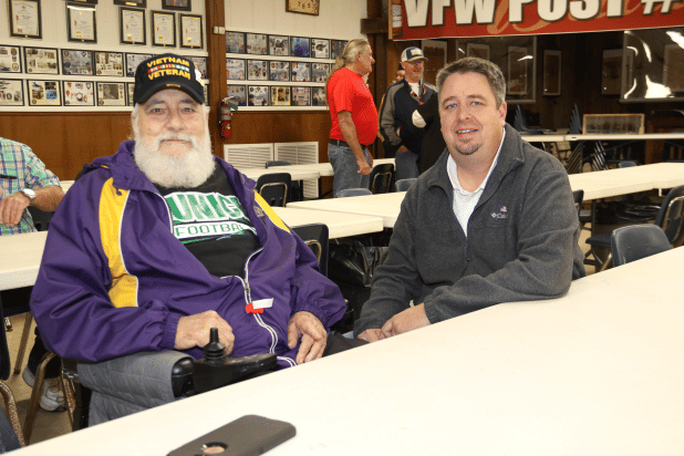 Former Police Chief Gary "Goose" Fontenot and his son, Mayor Scott Fontenot, at the Veterans Day ceremony this year at the VFW Post 8971.  (Photo by Harlan Kirgan)