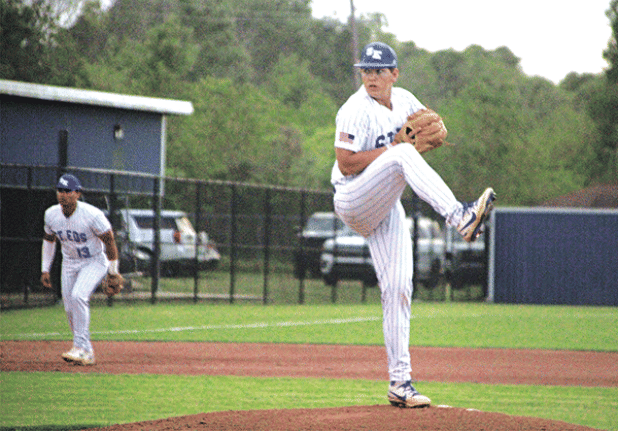 Clay Aguillard fires a pitch in St. Ed’s 8-3 win over Berchmans Academy in their opening game of the District 5-1A tournament on Thursday. Aguillard went four innings, didn’t give up an earned run and struck out four Saint hitters. (Photos by Rhett Manuel)